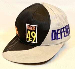CAPPELLO CON VISIERA PLAYER NUMBER 49 verde beige